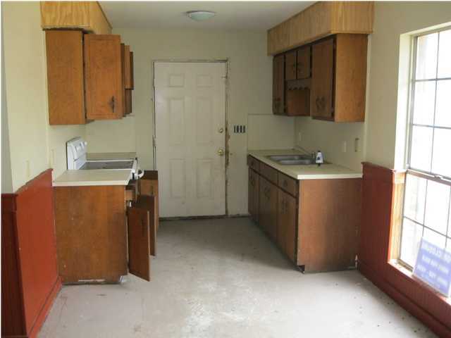 6200 Old Hickory Road Crestview, FL 32539 - Photo 6 of 10 a room with a sink cabinets and a window