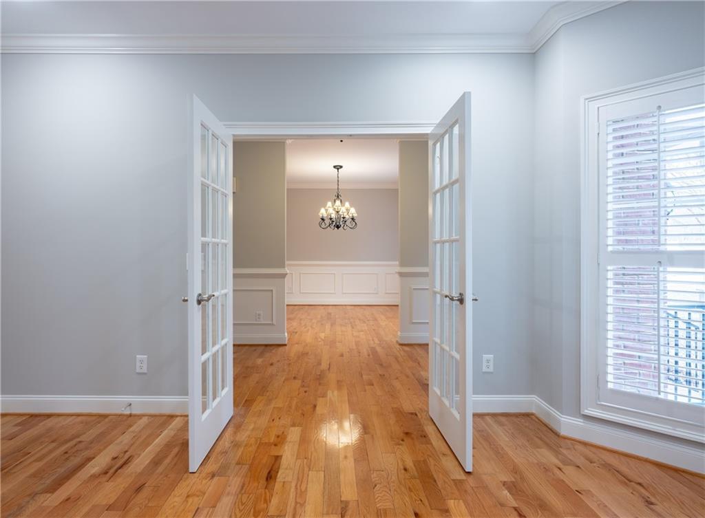 122 Caverns Way Northeast Calhoun, GA 30701 - Photo 12 of 56 a view of a room with wooden floor and a bathroom