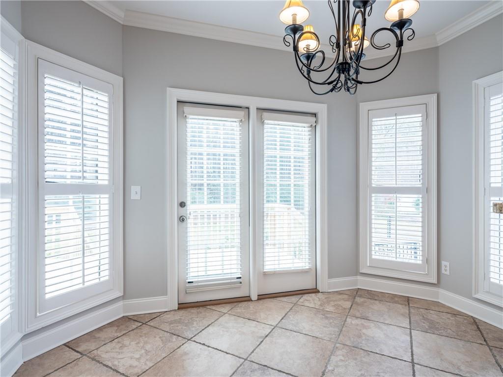 122 Caverns Way Northeast Calhoun, GA 30701 - Photo 22 of 56 a view of an empty room with windows