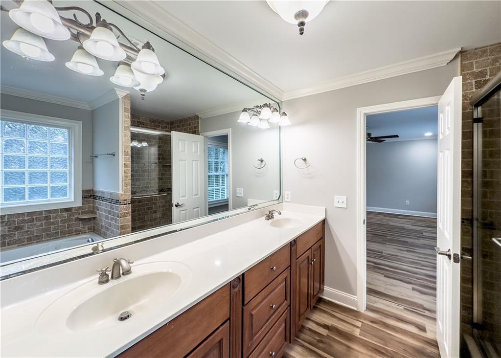 122 Caverns Way Northeast Calhoun, GA 30701 - Photo 36 of 56 a spacious bathroom with a double vanity sink mirror and double
