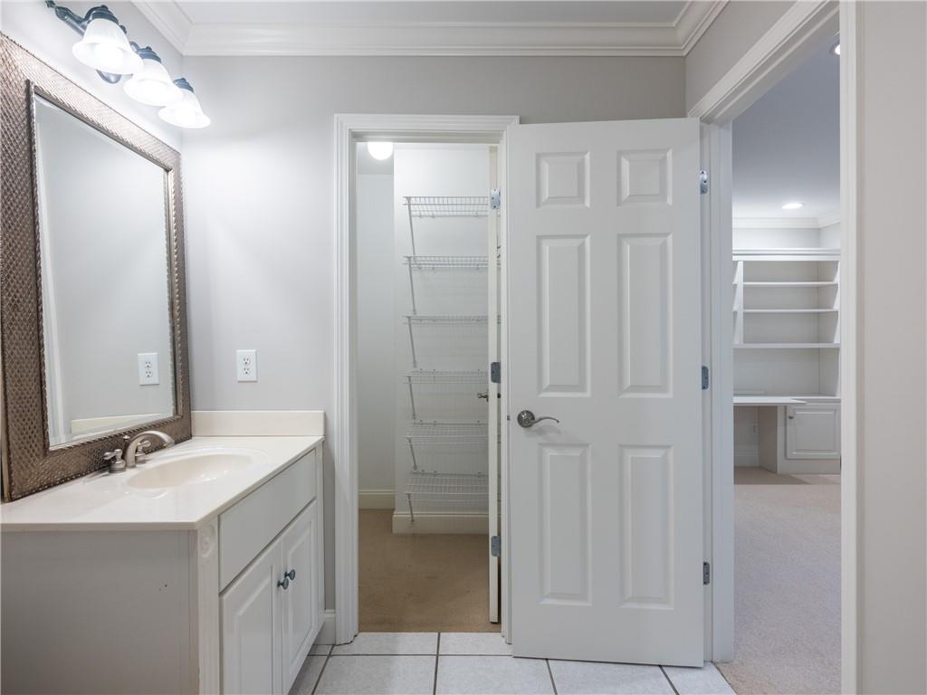 122 Caverns Way Northeast Calhoun, GA 30701 - Photo 45 of 56 a bathroom with a sink and a mirror