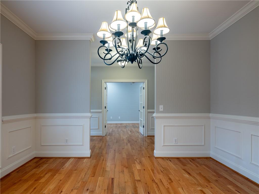 122 Caverns Way Northeast Calhoun, GA 30701 - Photo 7 of 56 a view of a hallway with wooden floor