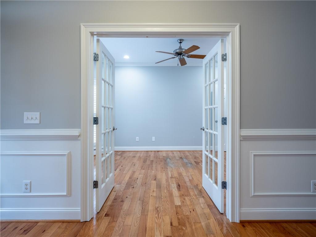 122 Caverns Way Northeast Calhoun, GA 30701 - Photo 8 of 56 a view of a hallway with wooden floor and closet