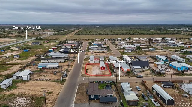 a view of a street with cars