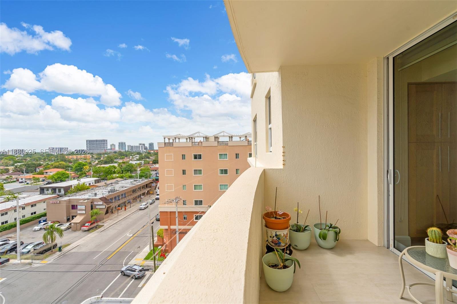 3232 Southwest 22nd Terrace, Unit 801 Miami, FL 33145 - Photo 15 of 23 a view of a city from a balcony