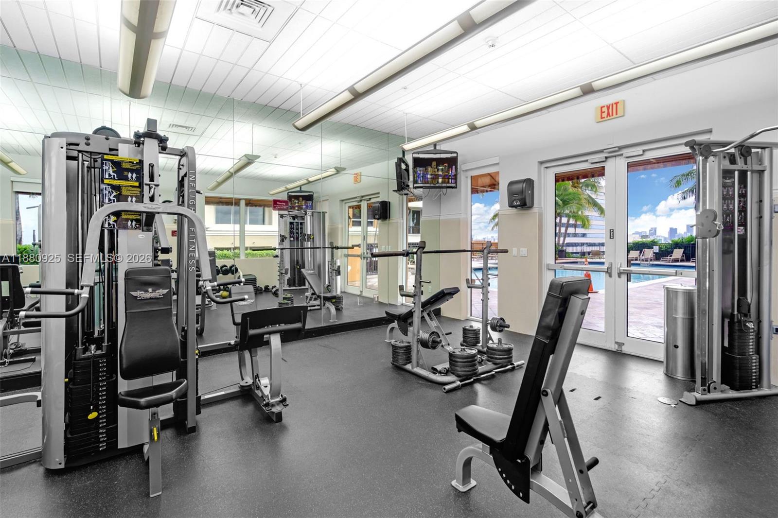 3232 Southwest 22nd Terrace, Unit 801 Miami, FL 33145 - Photo 20 of 23 a view of a room with gym equipment