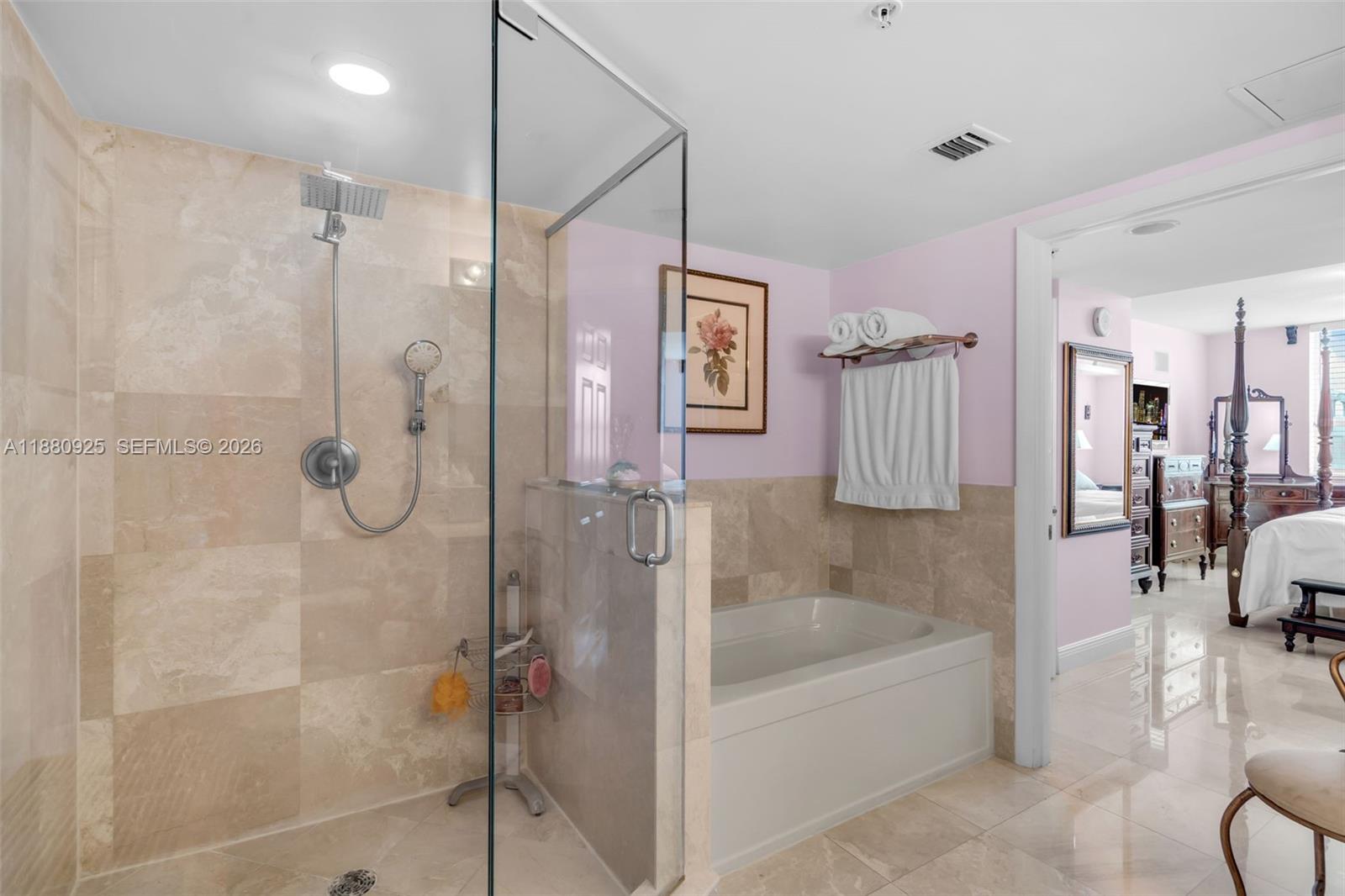 3232 Southwest 22nd Terrace, Unit 801 Miami, FL 33145 - Photo 10 of 23 a bathroom with a bathtub and a shower