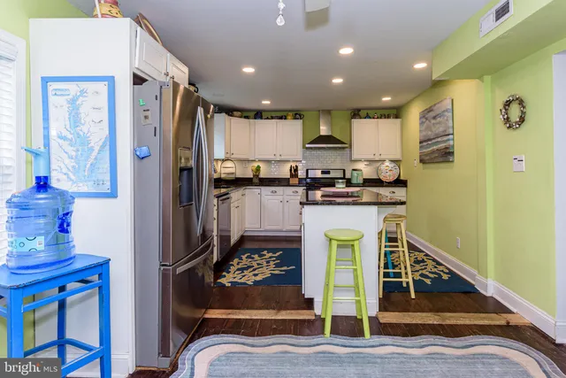 a bedroom with a bed and dresser