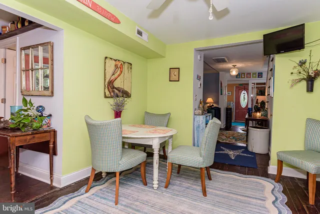 a bedroom with a bed and a chair