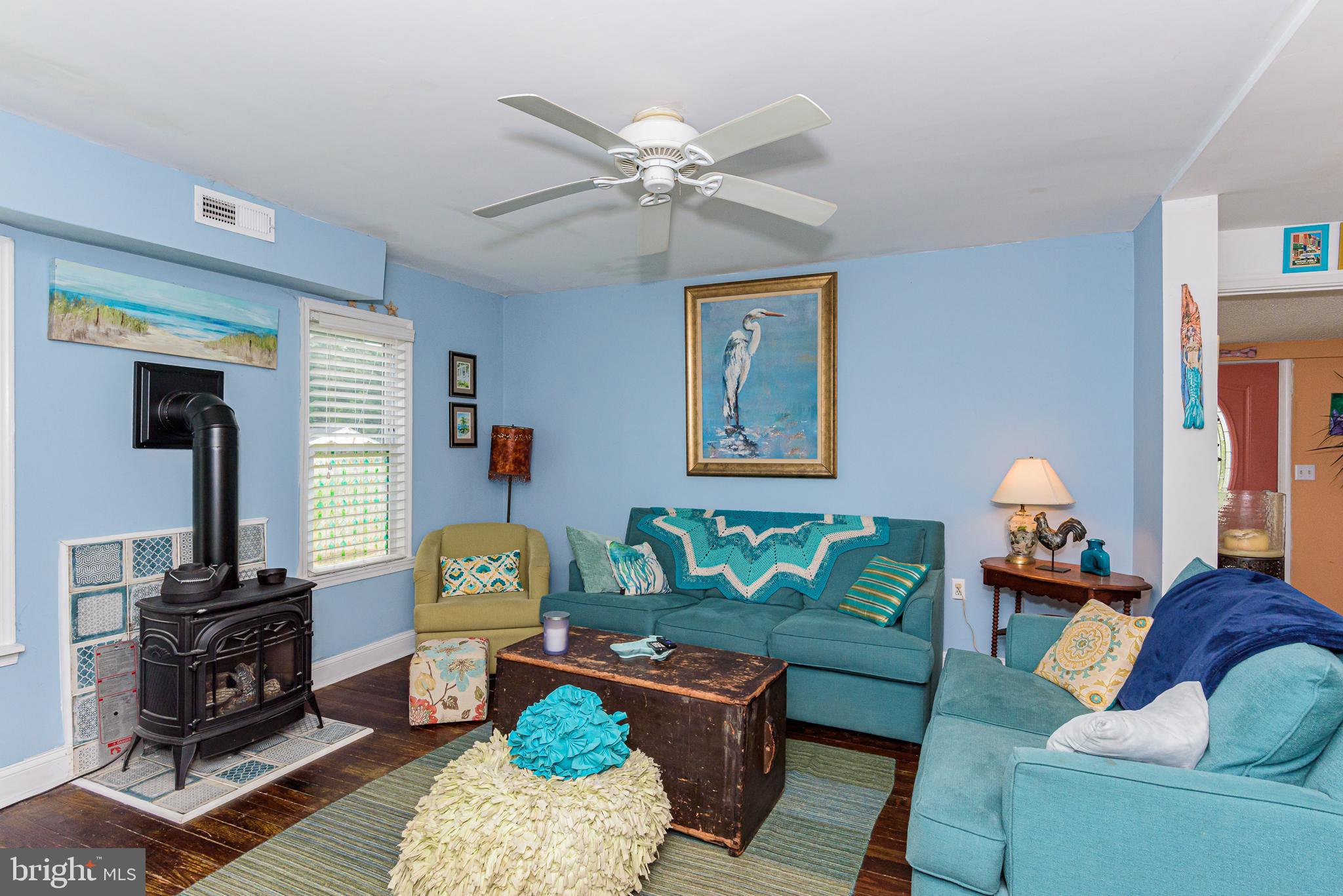 10213 Germantown Road Berlin, MD 21811 - Photo 27 of 118 a living room with furniture and a window