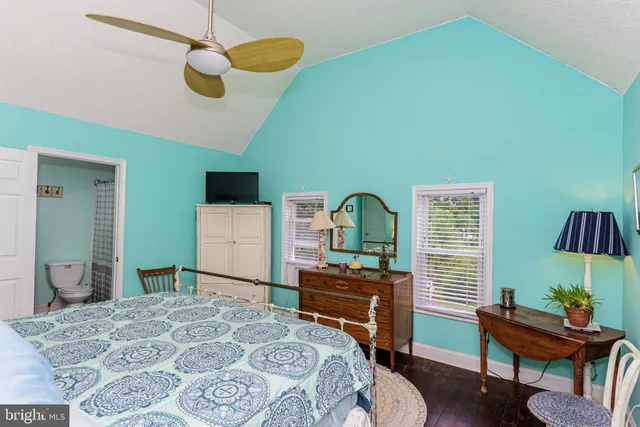 a view of a house with a door and wooden floor