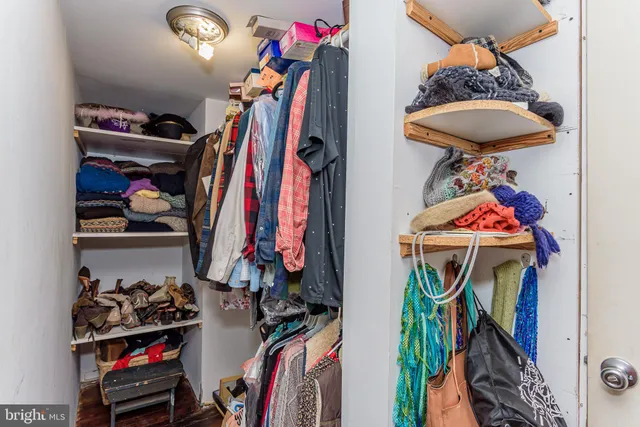 a view of a house with a yard patio and a slide