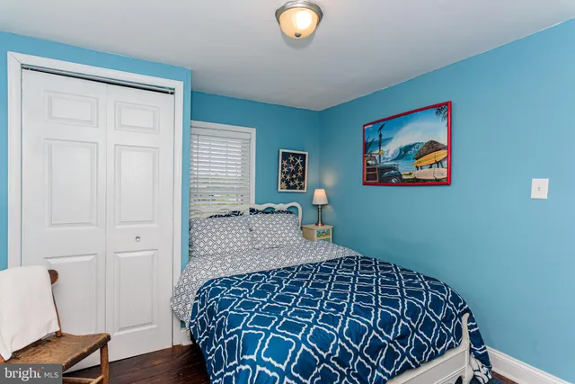 a view of a backyard with sitting area and garden