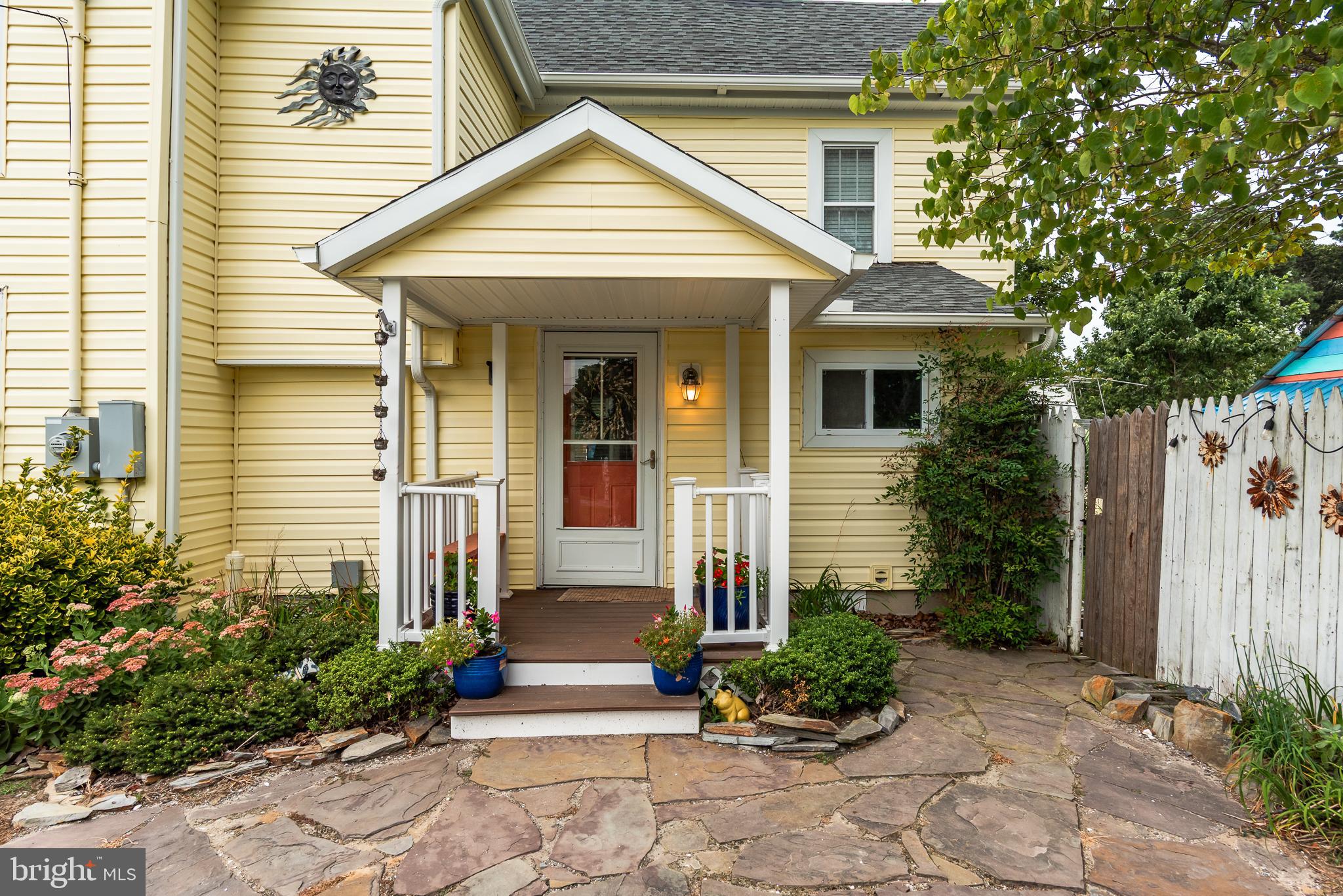 10213 Germantown Road Berlin, MD 21811 - Photo 5 of 118 a front view of a house with garden