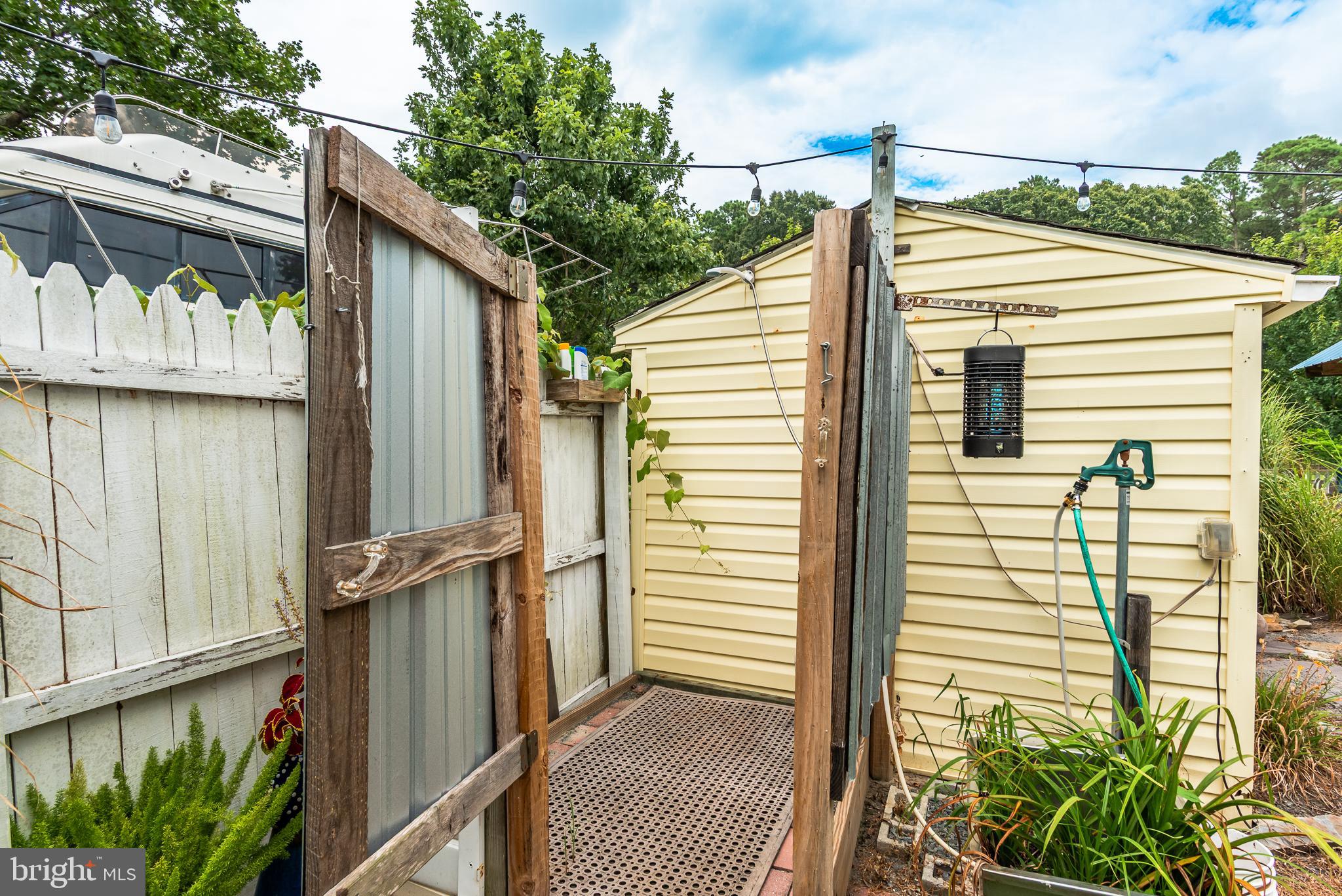 10213 Germantown Road Berlin, MD 21811 - Photo 88 of 118 a view of a house with a door and wooden floor