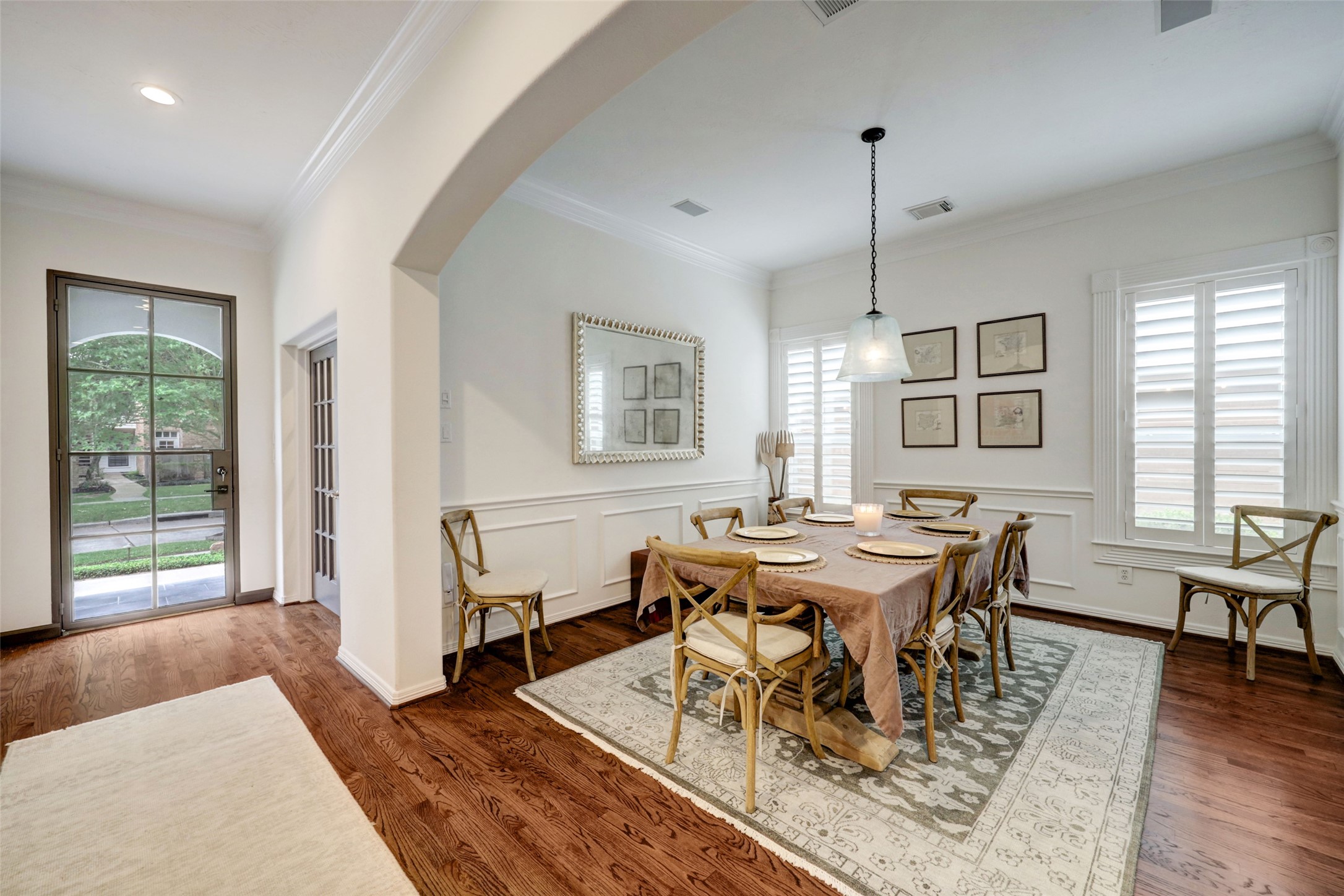 4004 Childress Street Houston, TX 77005 - Photo 17 of 35 a view of a dining room with furniture window and wooden floor