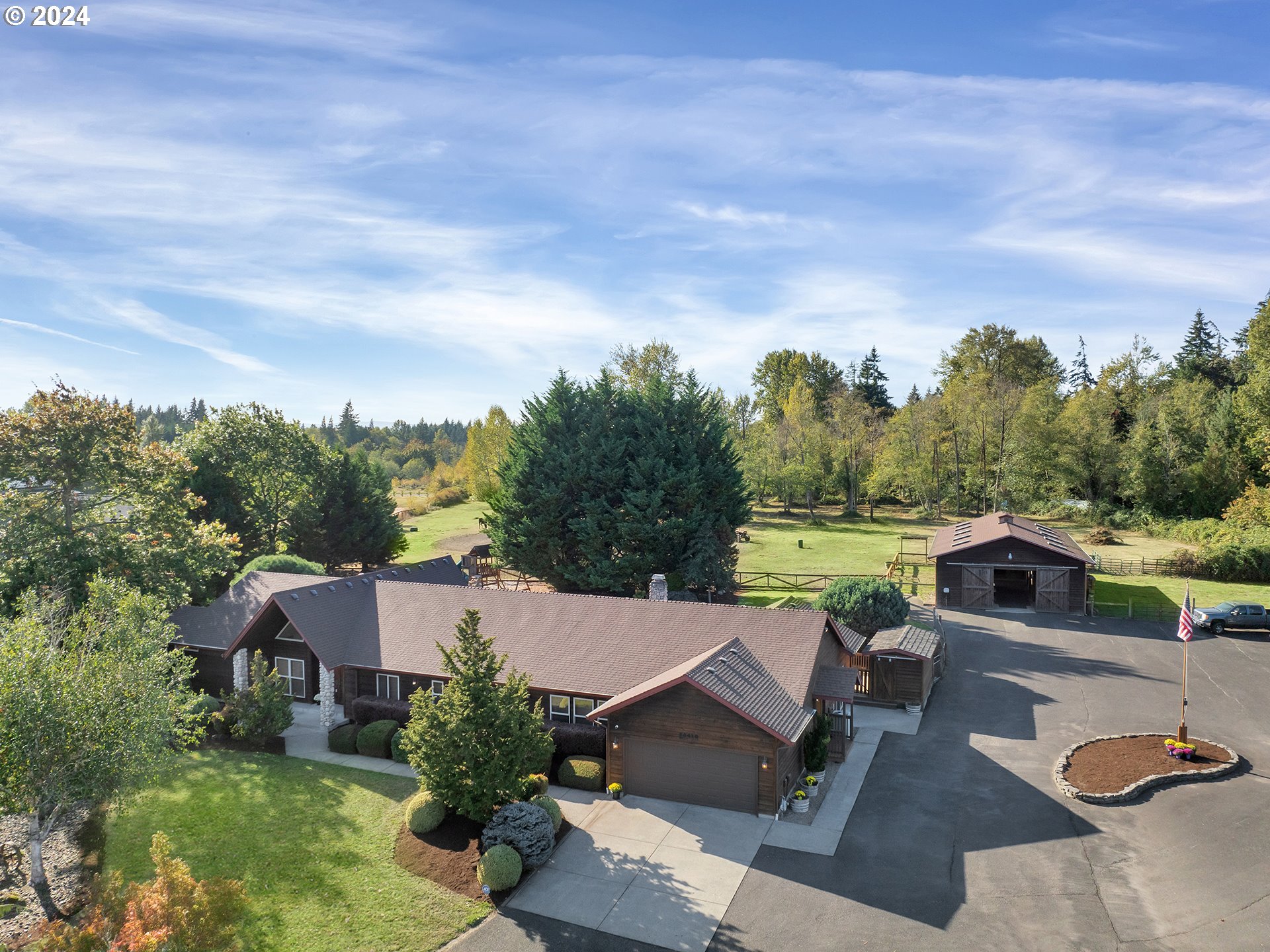 30410 Northwest 18th Place Ridgefield, WA 98642 - Photo 1 of 43 an aerial view of a house with garden space and street view