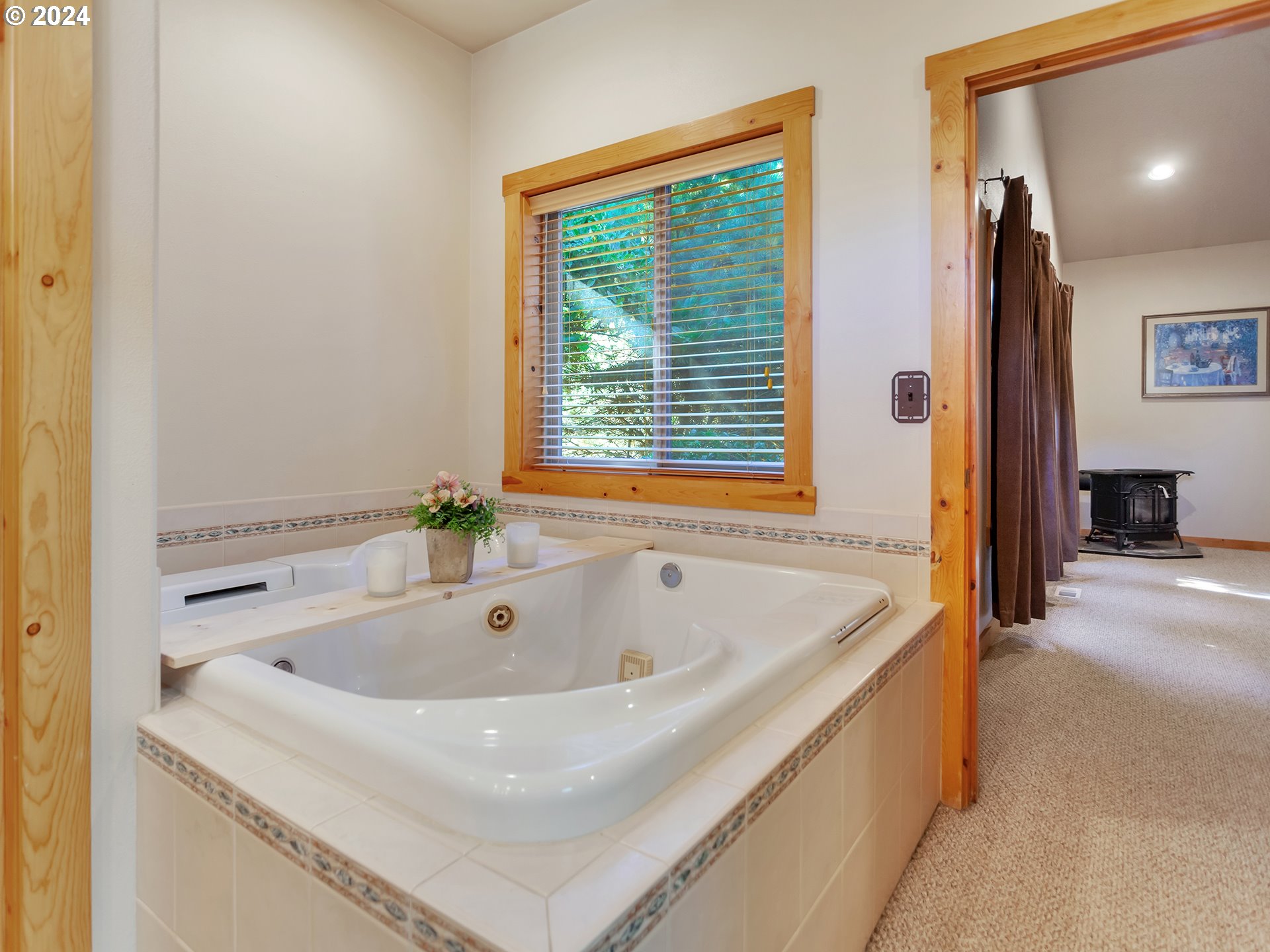 30410 Northwest 18th Place Ridgefield, WA 98642 - Photo 14 of 43 a bath tub sitting in a bathroom next to a window
