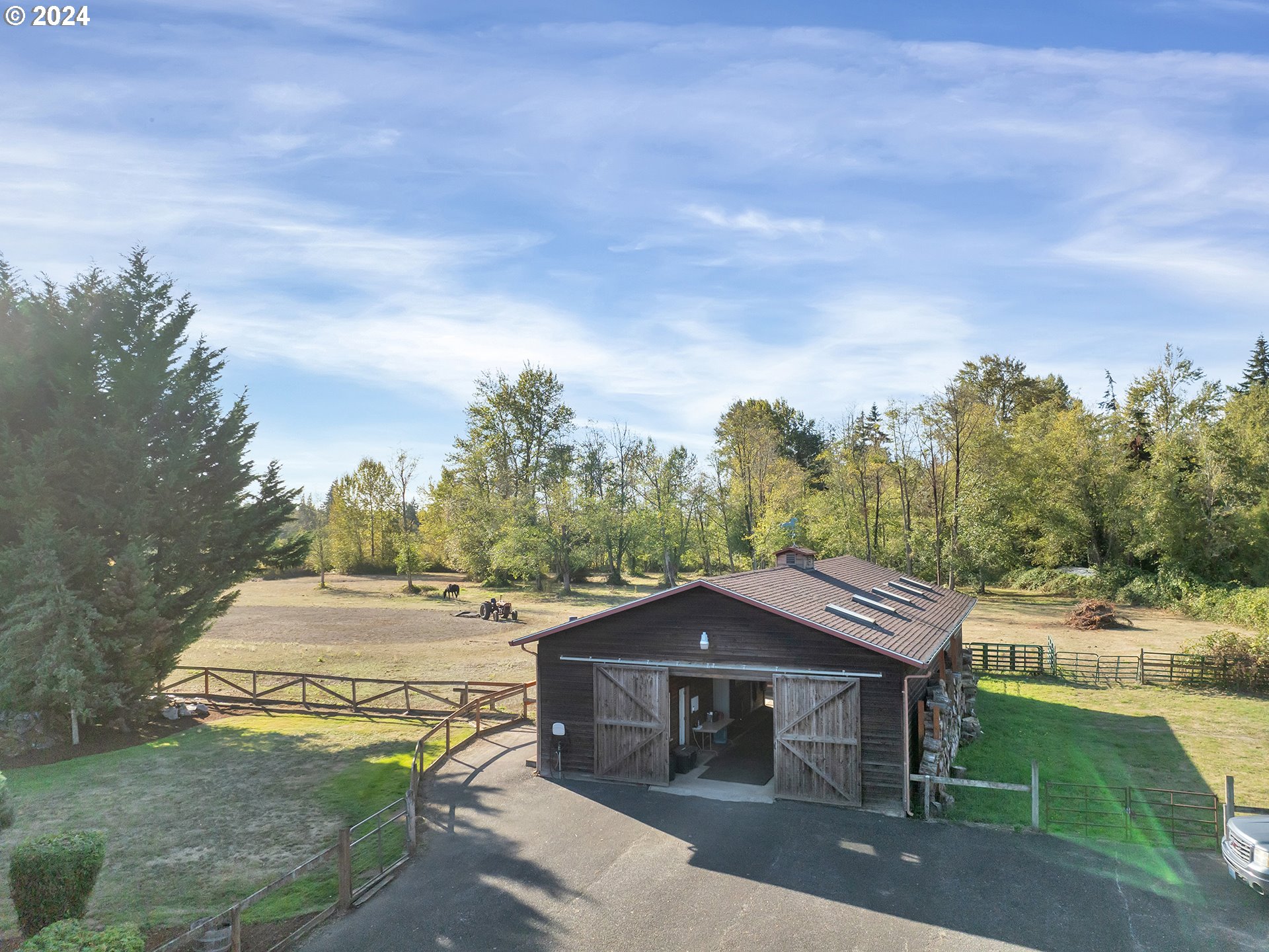 30410 Northwest 18th Place Ridgefield, WA 98642 - Photo 25 of 43 a view of a house with a yard siting area and garden