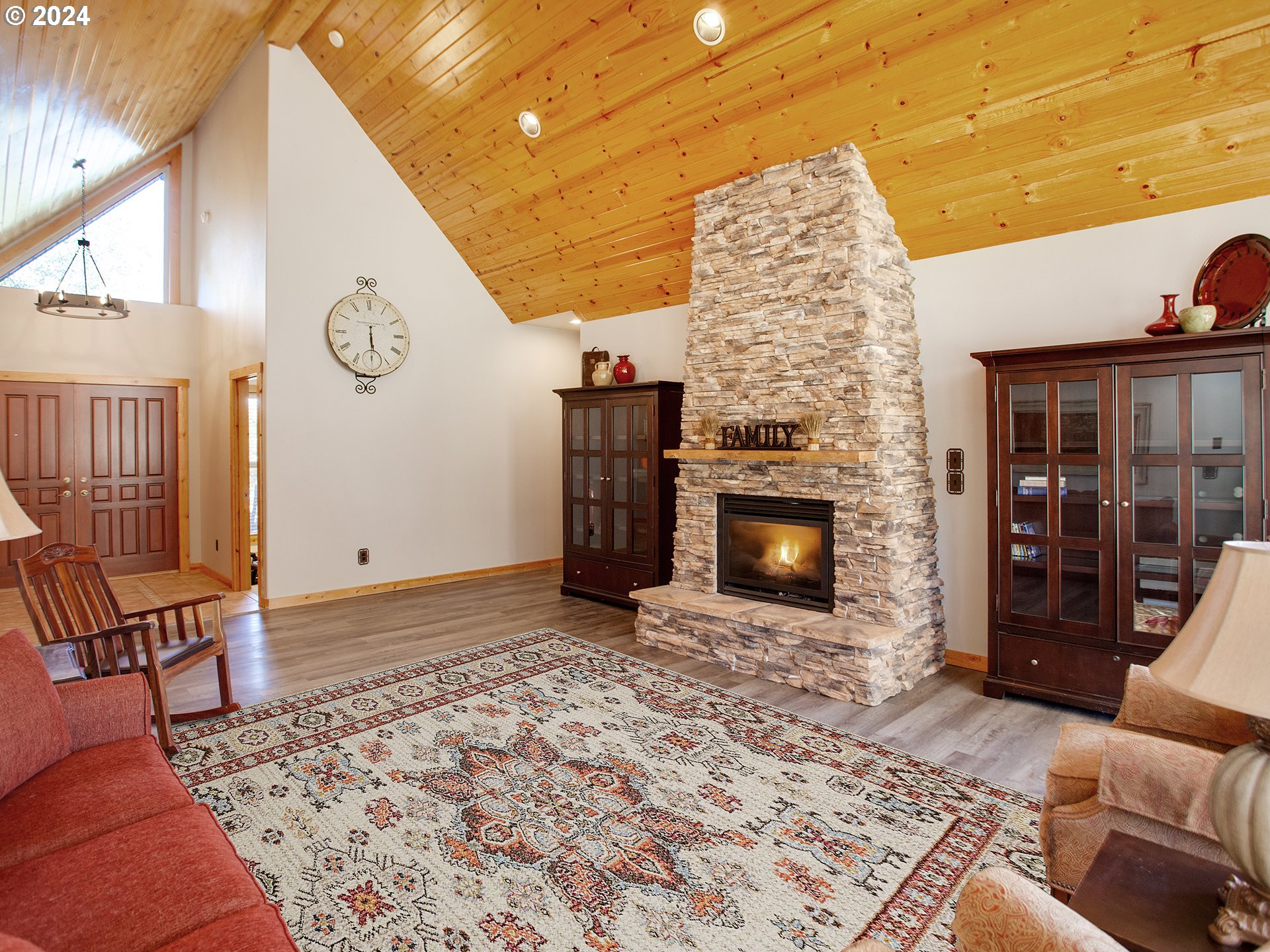 30410 Northwest 18th Place Ridgefield, WA 98642 - Photo 8 of 43 a living room with furniture and a fireplace