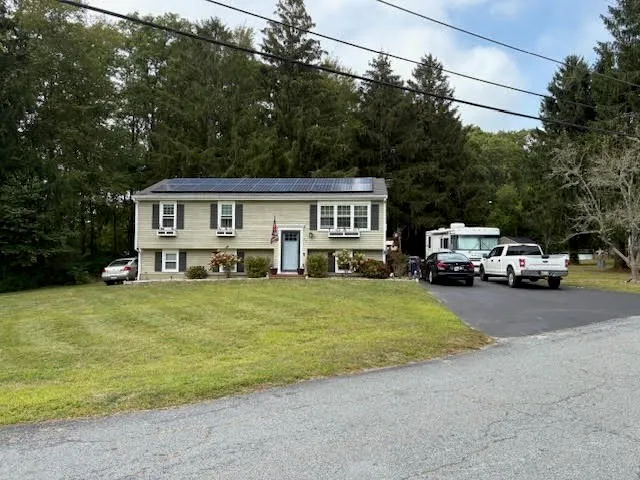 a house view with a garden space