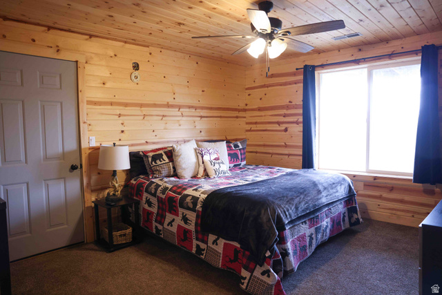 15253 Mill Road, Unit 62 Huntsville, UT 84317 - Photo 4 of 48 Wood-paneled walls and ceiling with a ceiling fan light fixture
