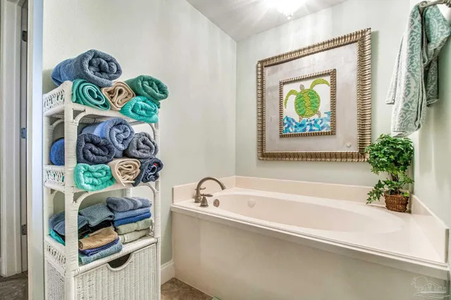a bathroom with a granite countertop sink mirror and