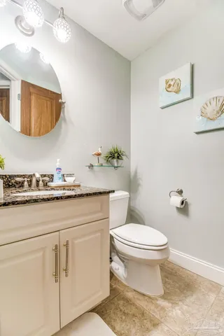 a bathroom with a bathtub and a toilet