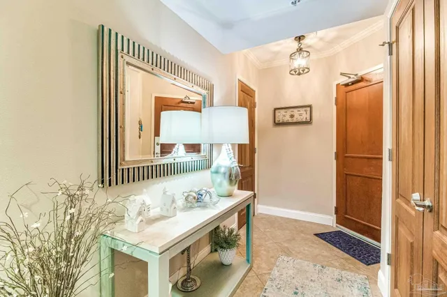 a bathroom with a granite countertop toilet and a sink