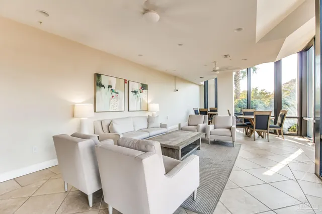 front view of a brick house with a yard