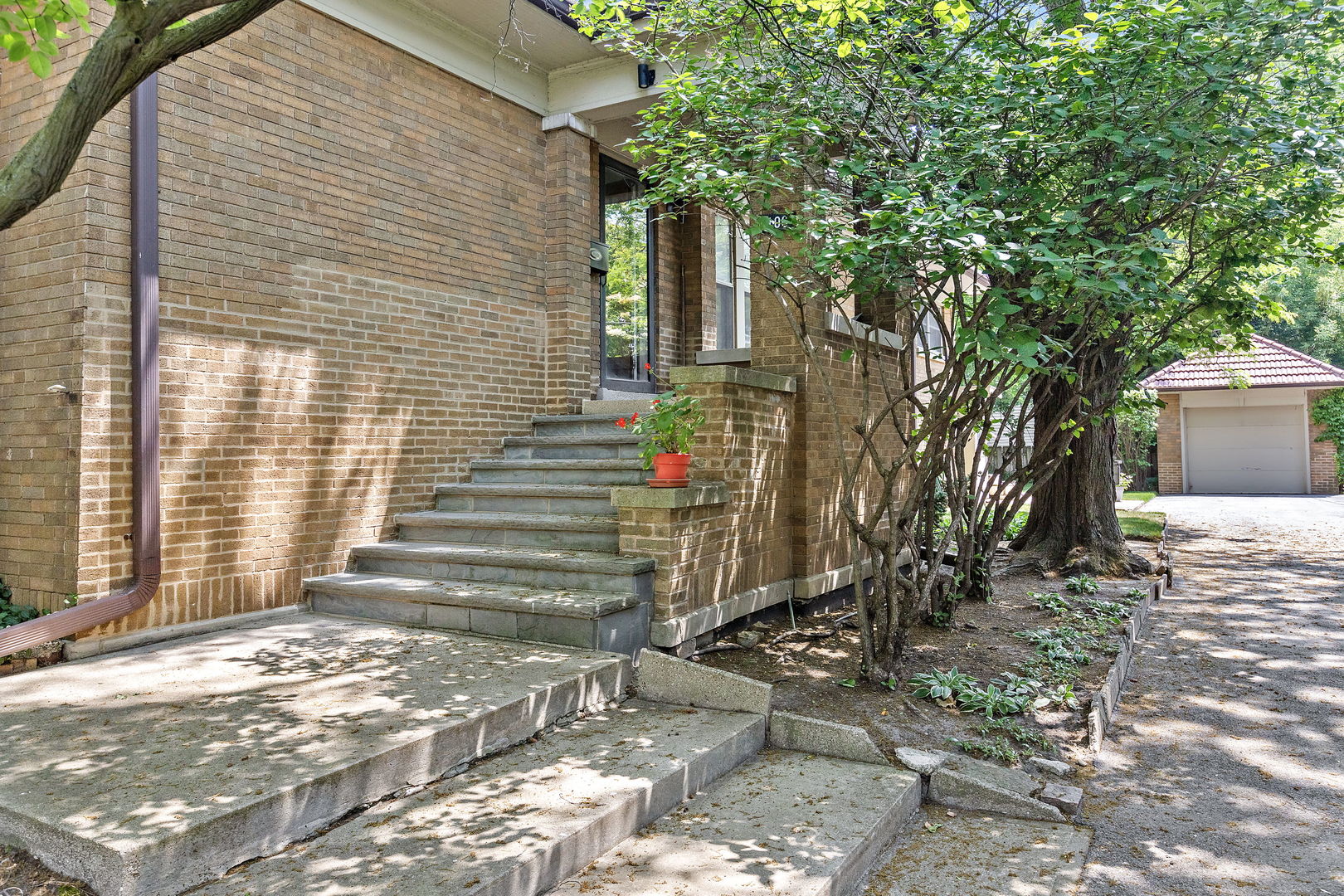 106 4th Street Wilmette, IL 60091 - Photo 17 of 20 a view of a house with a backyard