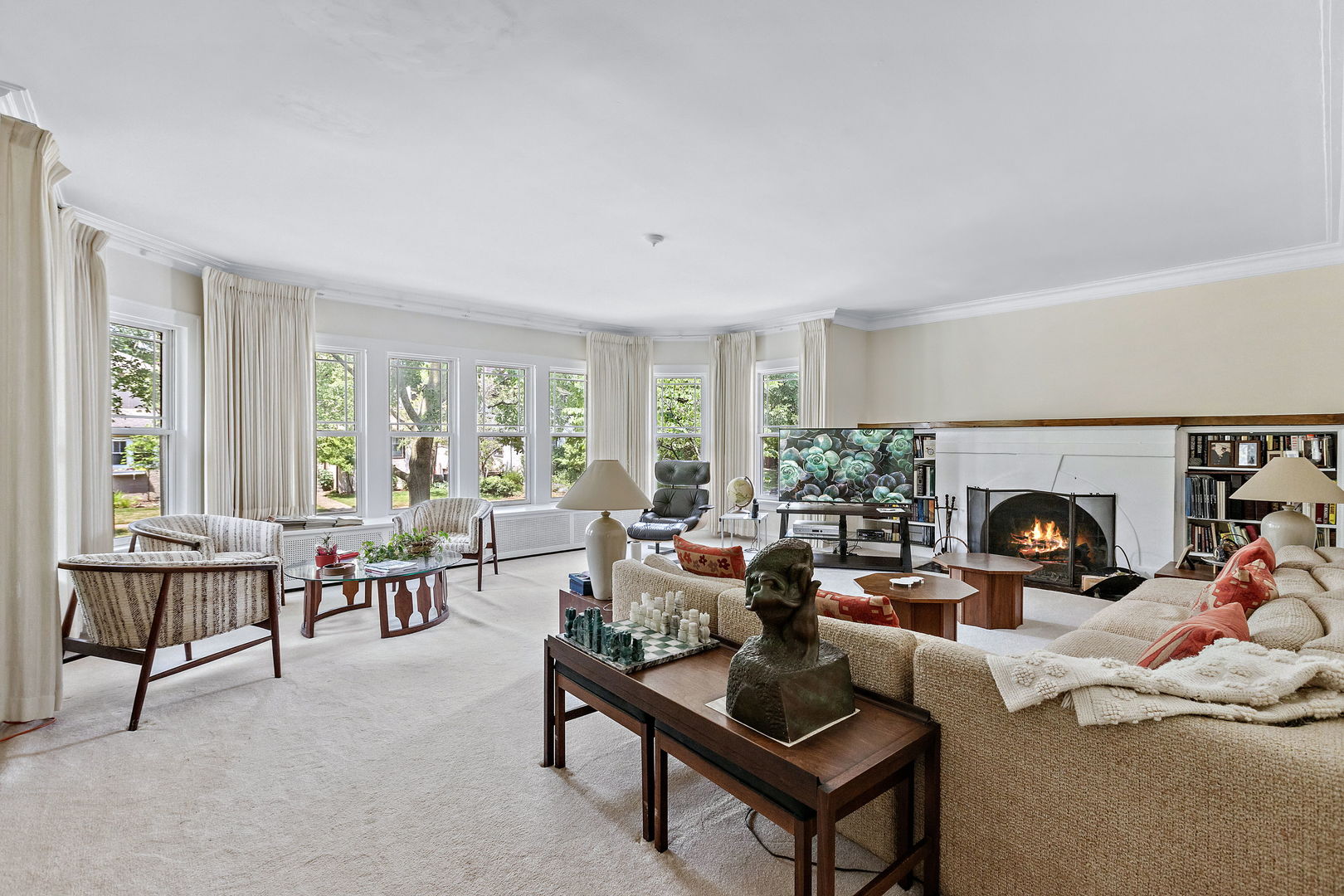 106 4th Street Wilmette, IL 60091 - Photo 3 of 20 a living room with furniture and a fireplace