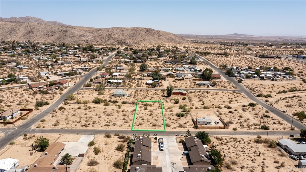4444 Plaza Road Joshua Tree, CA 92252 - Photo 1 of 1 an aerial view of residential building and parking space