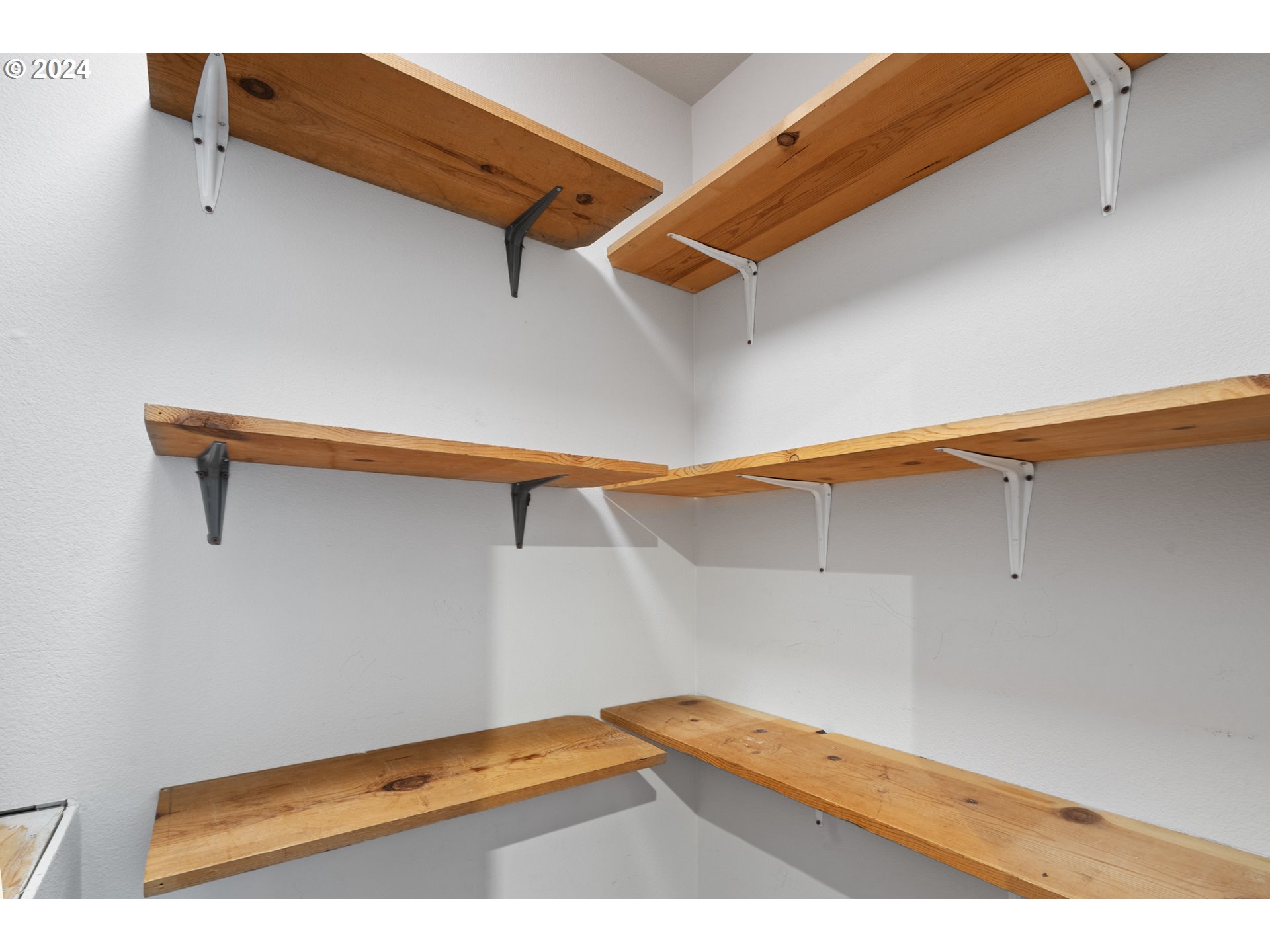 4016 Southwest Cullen Boulevard Portland, OR 97221 - Photo 16 of 41 a view of walk in closet