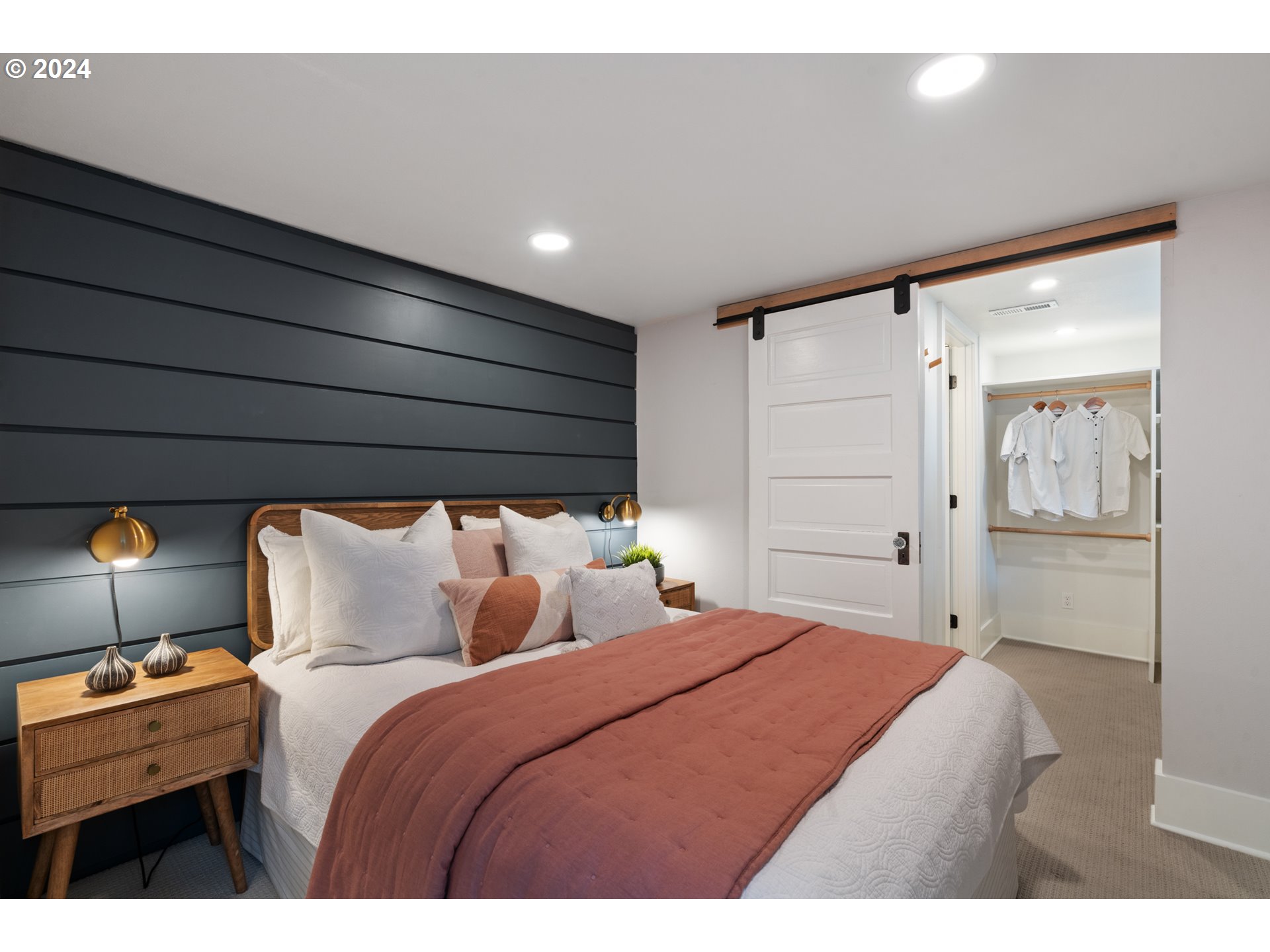 4016 Southwest Cullen Boulevard Portland, OR 97221 - Photo 22 of 41 a bedroom with a bed and a cabinets