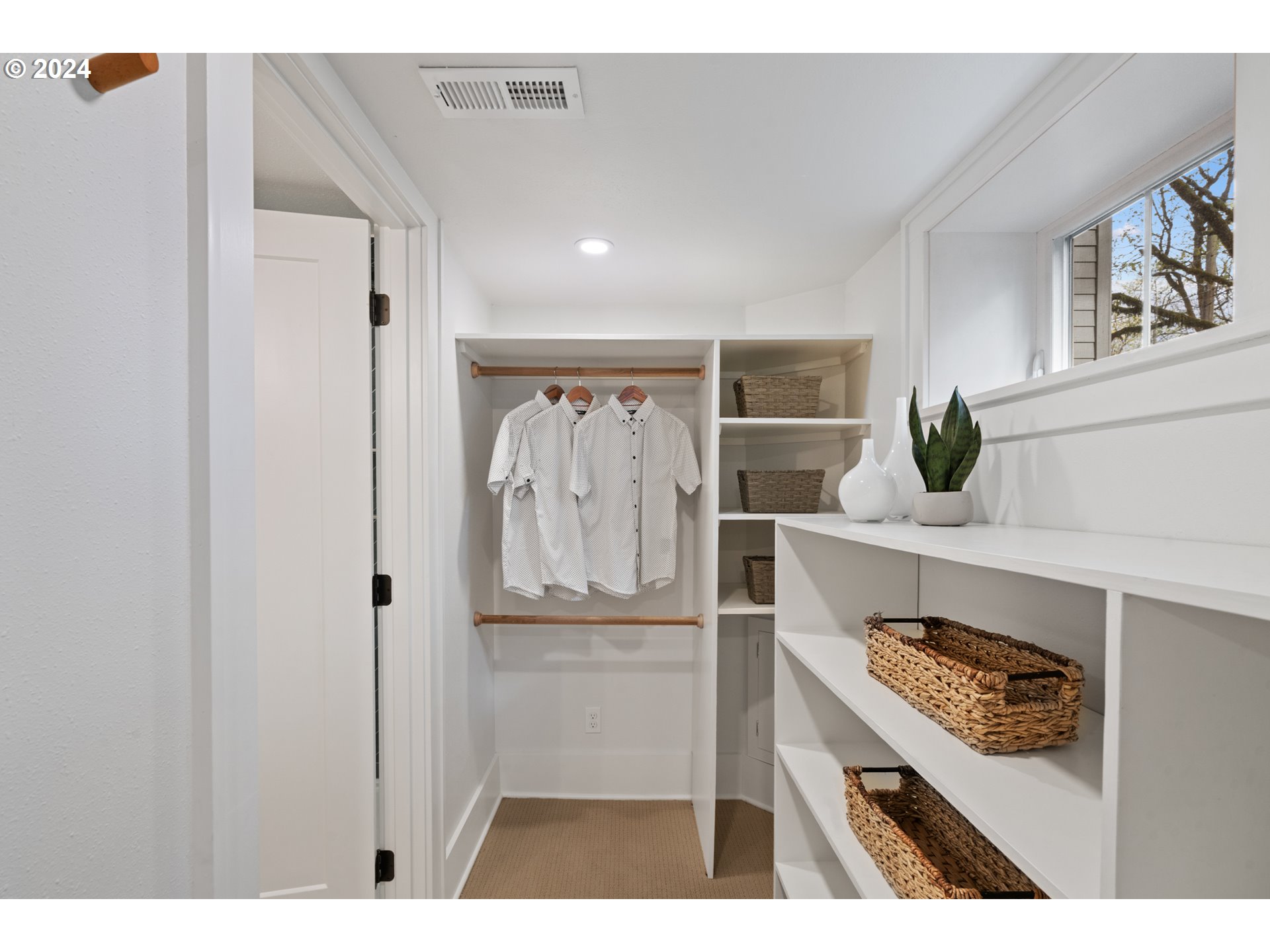 4016 Southwest Cullen Boulevard Portland, OR 97221 - Photo 23 of 41 a kitchen with white cabinets and refrigerator