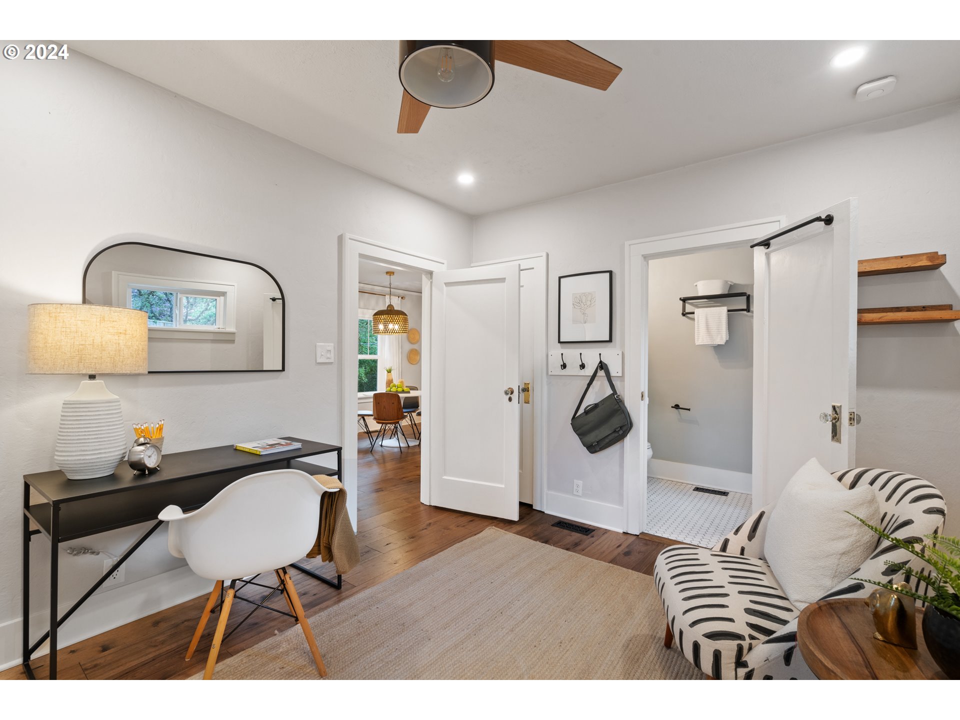 4016 Southwest Cullen Boulevard Portland, OR 97221 - Photo 28 of 41 a workspace room with furniture and wooden floor
