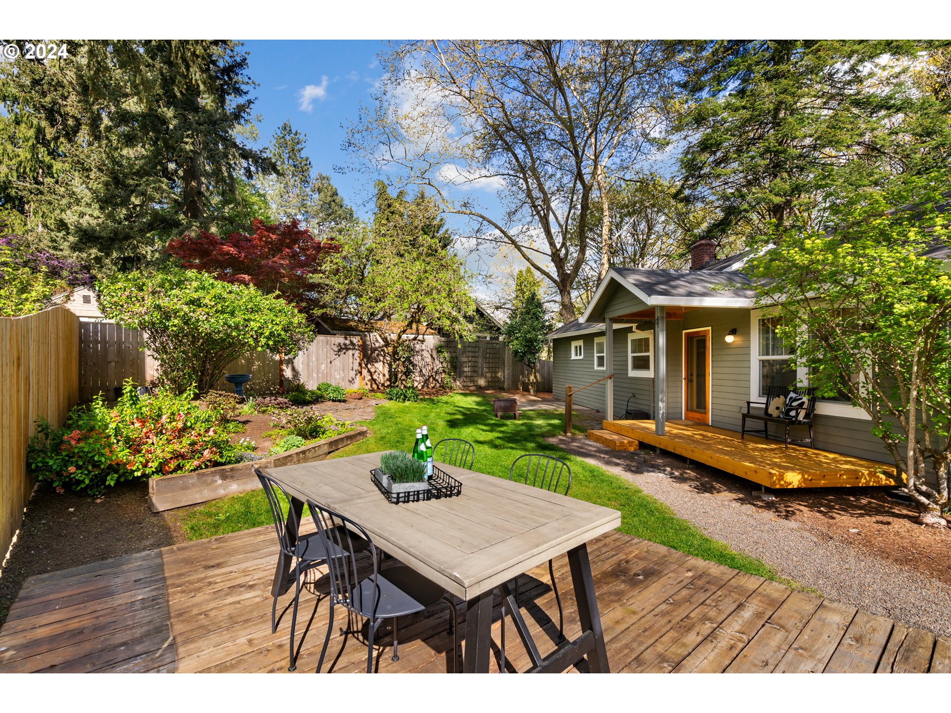4016 Southwest Cullen Boulevard Portland, OR 97221 - Photo 32 of 41 a view of a house with backyard and sitting area