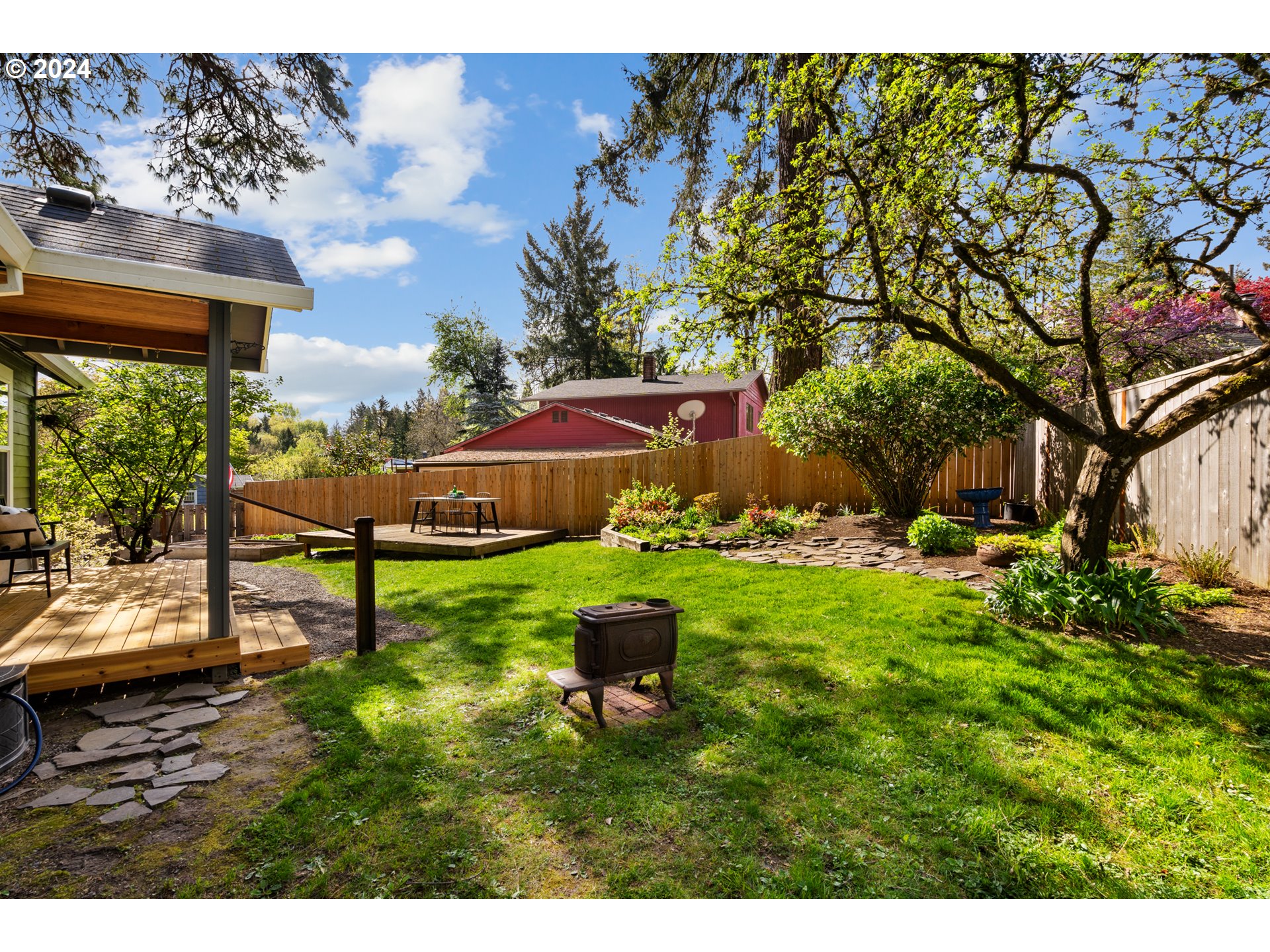 4016 Southwest Cullen Boulevard Portland, OR 97221 - Photo 35 of 41 a swimming pool with outdoor seating and yard