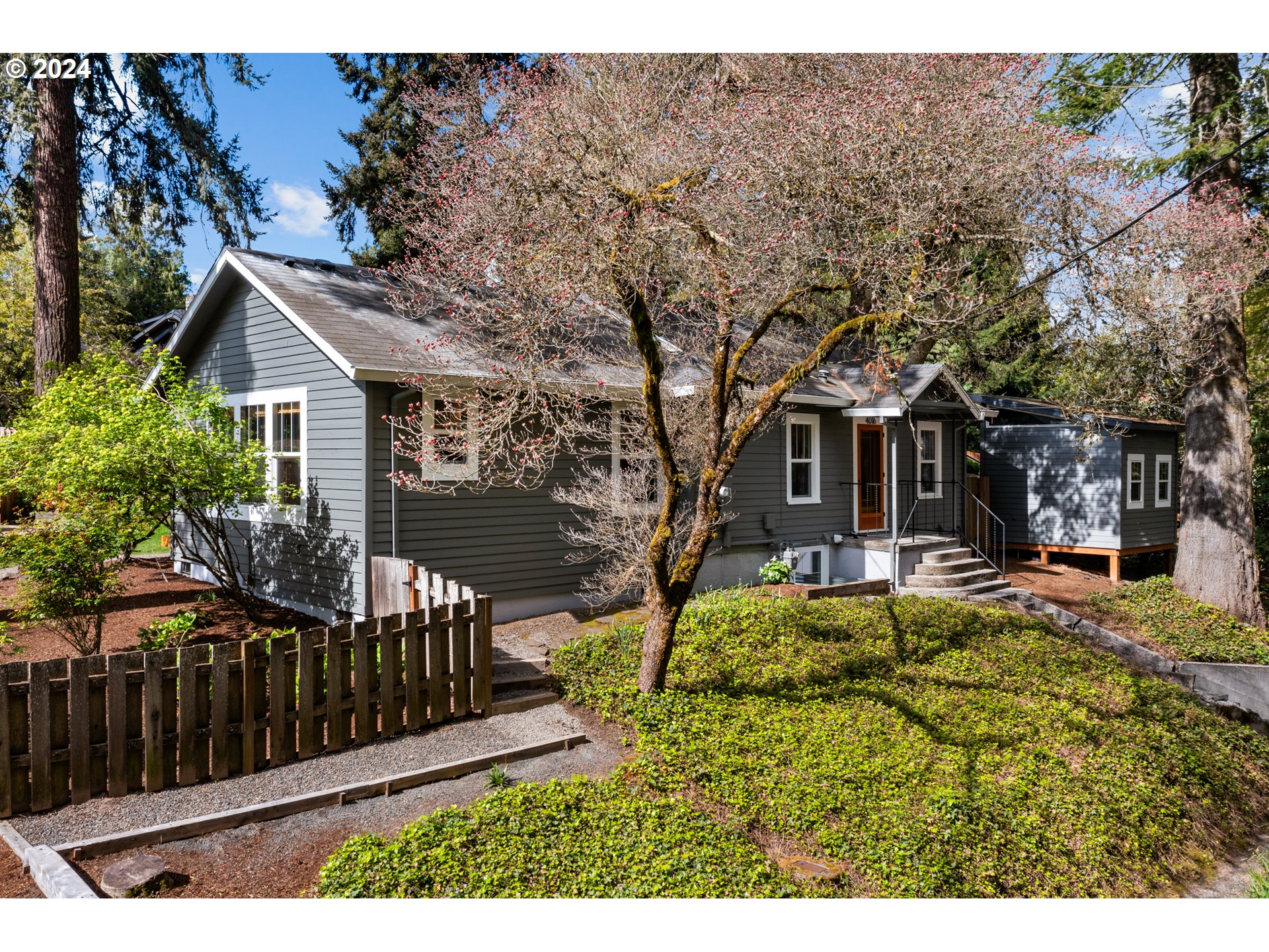4016 Southwest Cullen Boulevard Portland, OR 97221 - Photo 40 of 41 a view of a house with backyard and sitting area