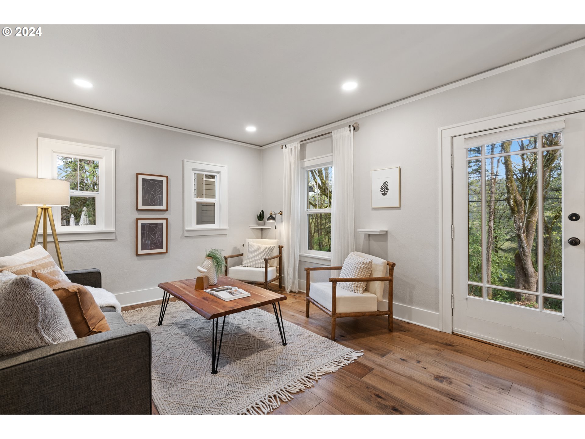 4016 Southwest Cullen Boulevard Portland, OR 97221 - Photo 4 of 41 a living room with furniture and a window