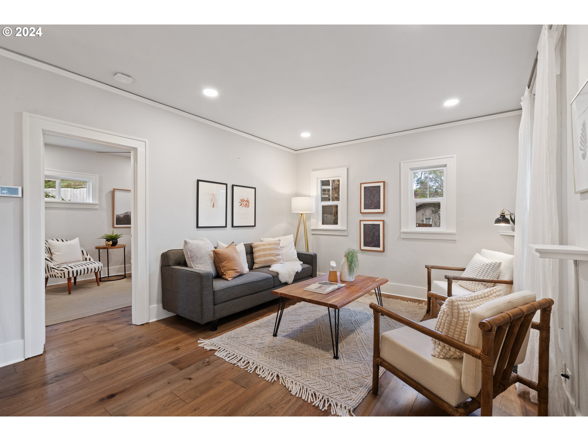 4016 Southwest Cullen Boulevard Portland, OR 97221 - Photo 5 of 41 a living room with furniture and wooden floor
