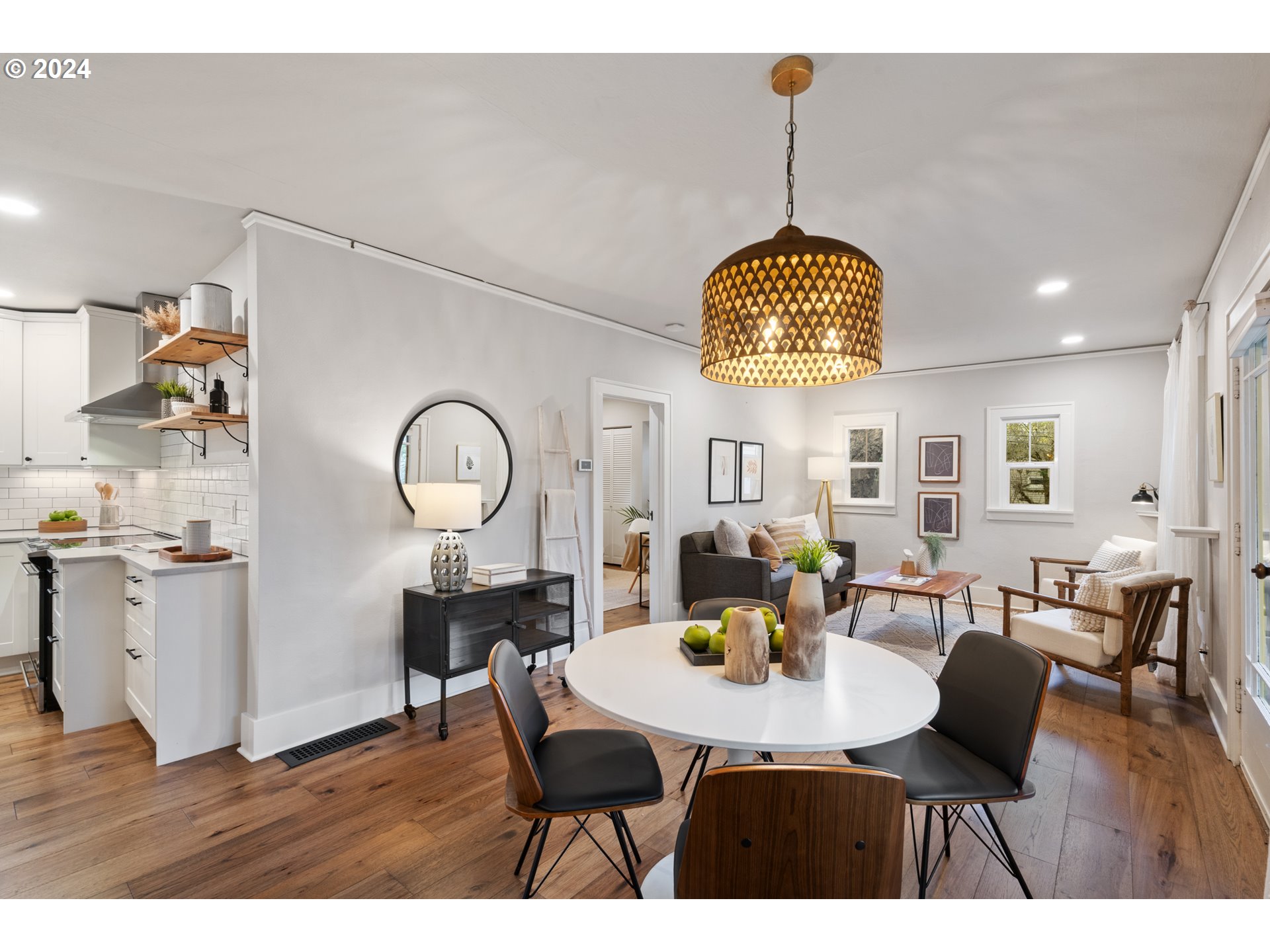4016 Southwest Cullen Boulevard Portland, OR 97221 - Photo 8 of 41 a view of a dining room with furniture window and wooden floor