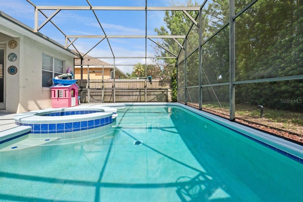 8484 Dover View Lane Orlando, FL 32829 - Photo 27 of 41 a outdoor view of a swimming pool