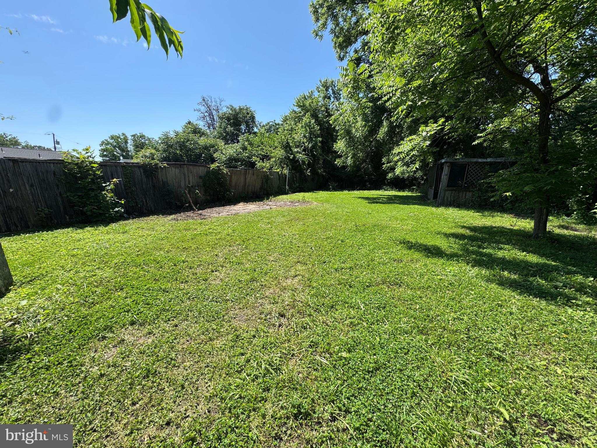 Wagner Avenue Sparrows Point, MD 21219 - Photo 1 of 7 a view of a garden with a building in the background