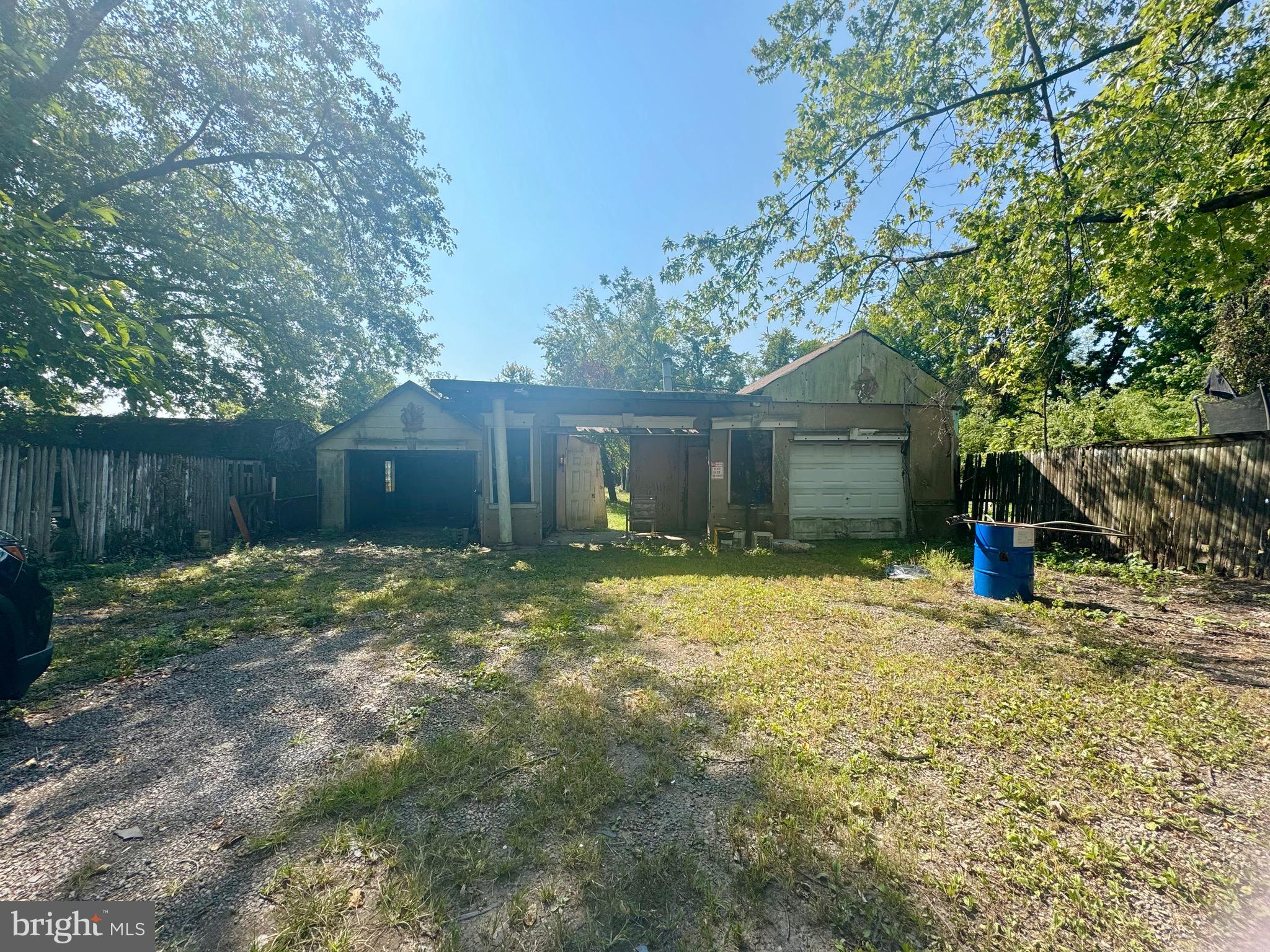 Wagner Avenue Sparrows Point, MD 21219 - Photo 4 of 7 a view of a house with a yard and sitting area
