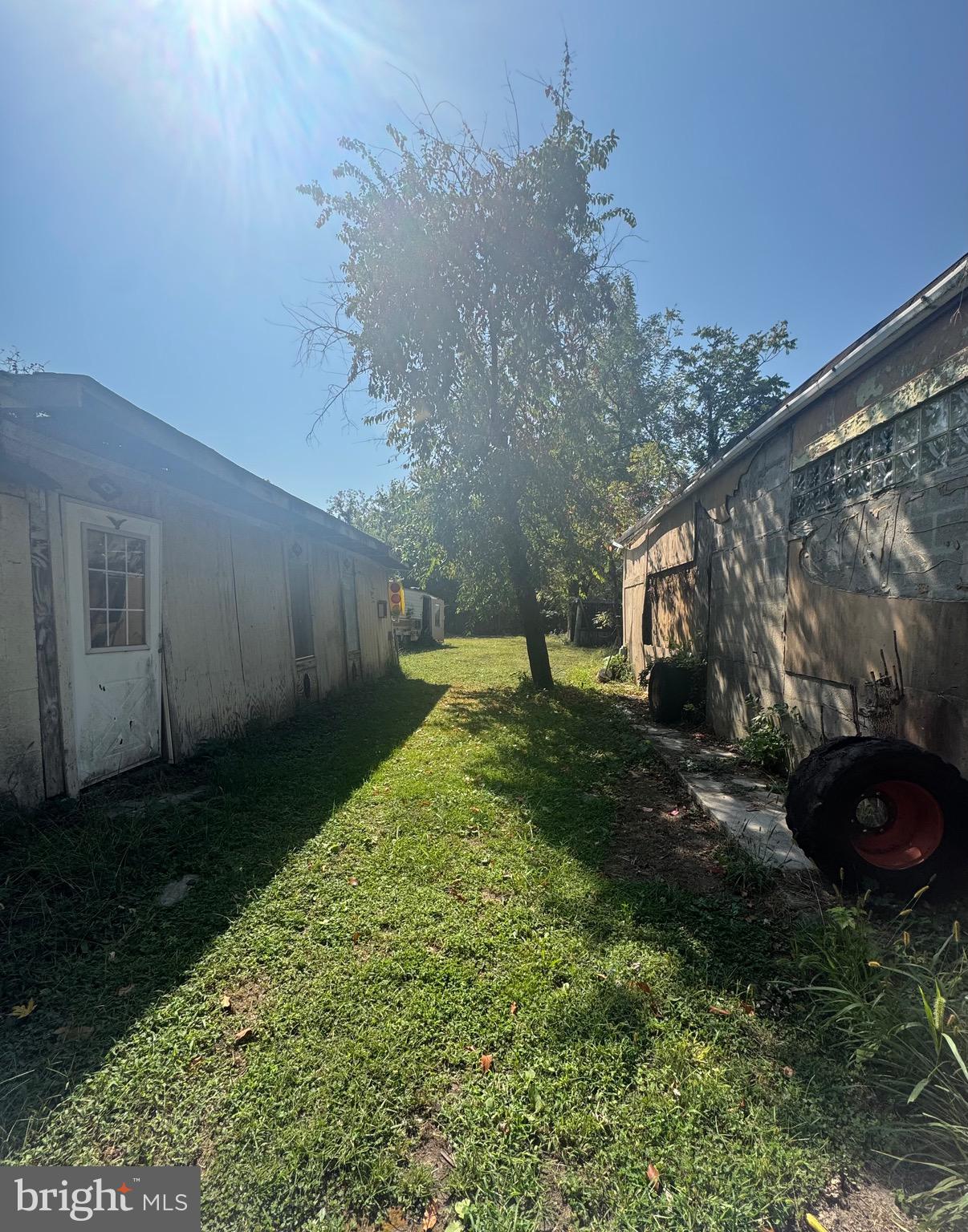 Wagner Avenue Sparrows Point, MD 21219 - Photo 5 of 7 a backyard of a house with lots of green space
