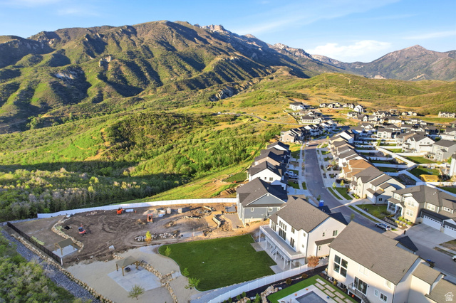 14648 South Springtime Road Draper, UT 84020 - Photo 45 of 47 Developing residential community featuring mountain backdrops, paved roads, and a mix of completed and under-construction homes