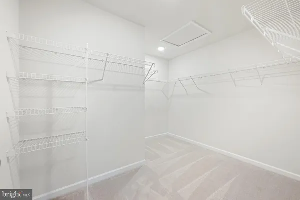 a view of a room with racks on the wall