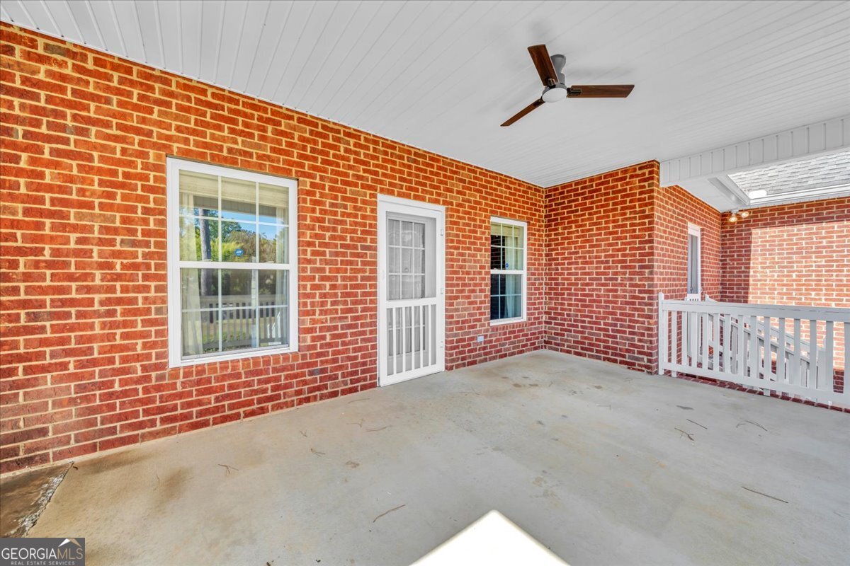 100 Fox Den Court Dublin, GA 31021 - Photo 22 of 26 a view of an empty room with a window